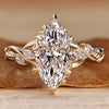 Marquise cut diamond ring with marquise side stones.