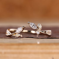 Marquise and round cut wedding band open gap.