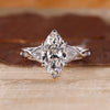 Seven stone diamond ring with marquise diamond centre.
