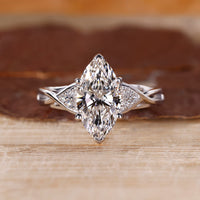 Seven stone diamond ring with marquise diamond centre.
