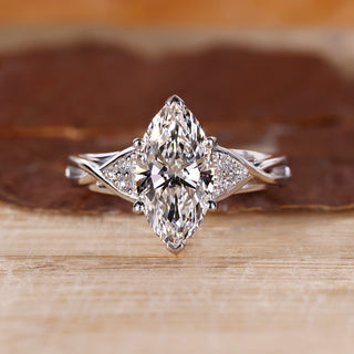 Seven stone diamond ring with marquise diamond centre.
