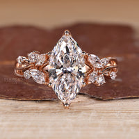 Marquise diamond ring cluster nature inspired style.