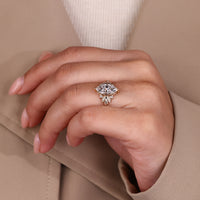 Marquise cut diamond ring in five stone style.
