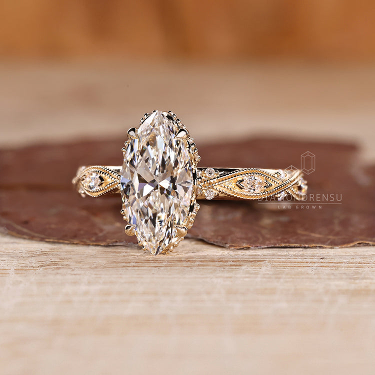 Art deco marquise diamond ring milgrain setting.
