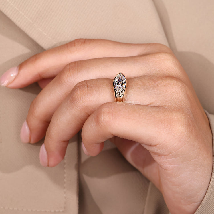 Lab grown diamond marquise ring in modern style.
