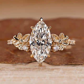 Marquise diamond ring pave round diamond nature style.