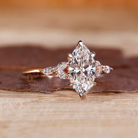Lab grown marquise diamond ring seven stone style.