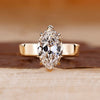 Solitaire diamond engagement ring with marquise old European cut.
