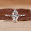 Marquise diamond ring solitaire compass prong twisted.
