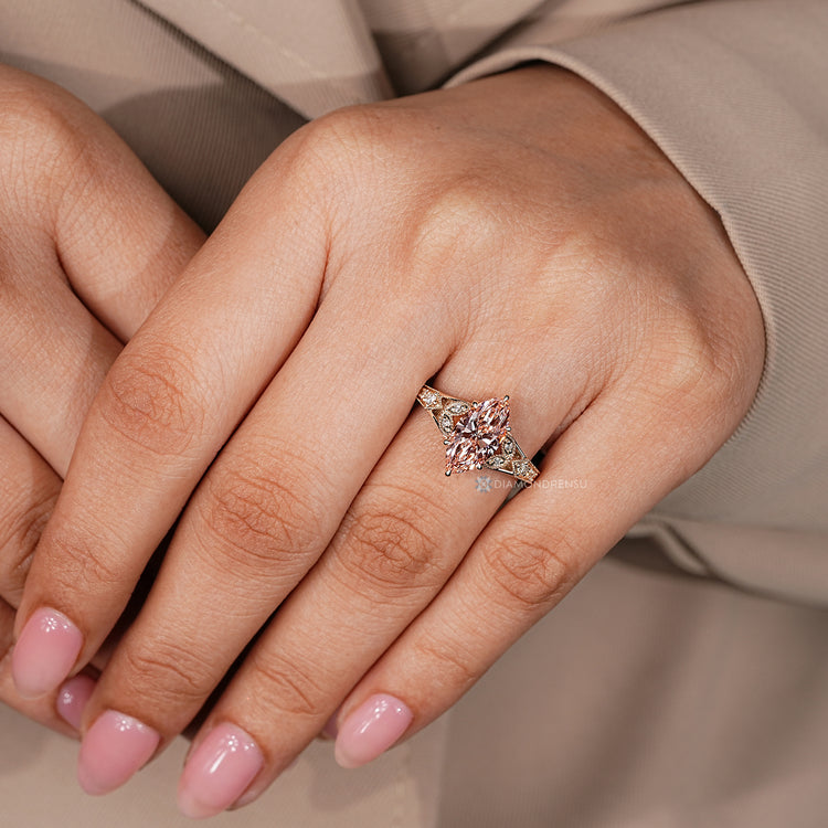 Marquise diamond ring with six claw and tulip basket setting.