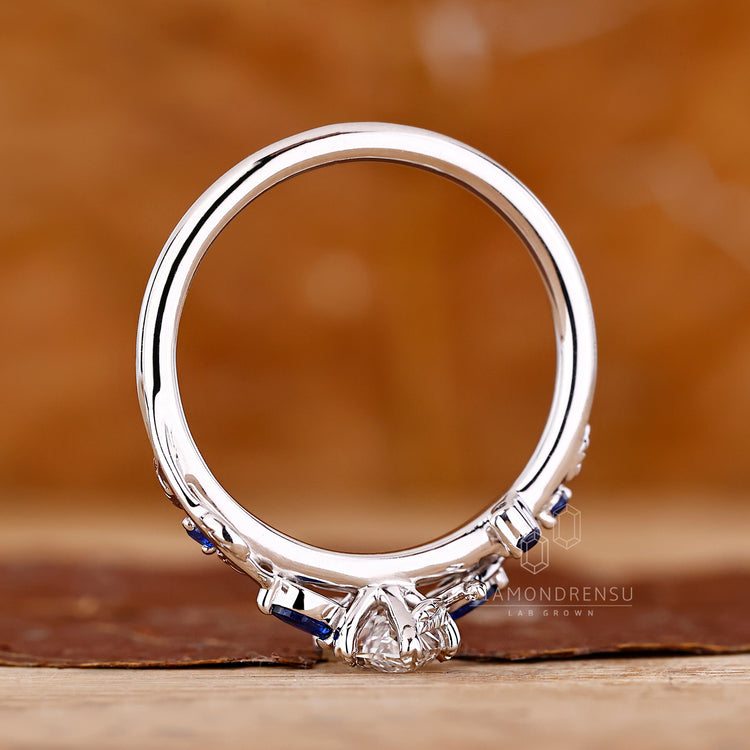 Marquise diamond ring round stones cluster style.

