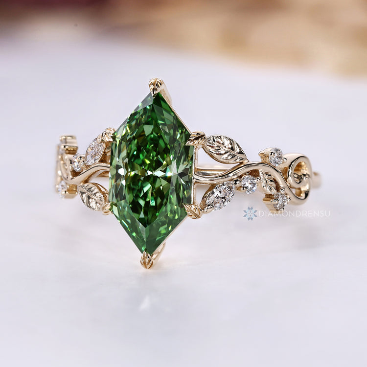 Dutch marquise diamond ring with leaf prong setting.