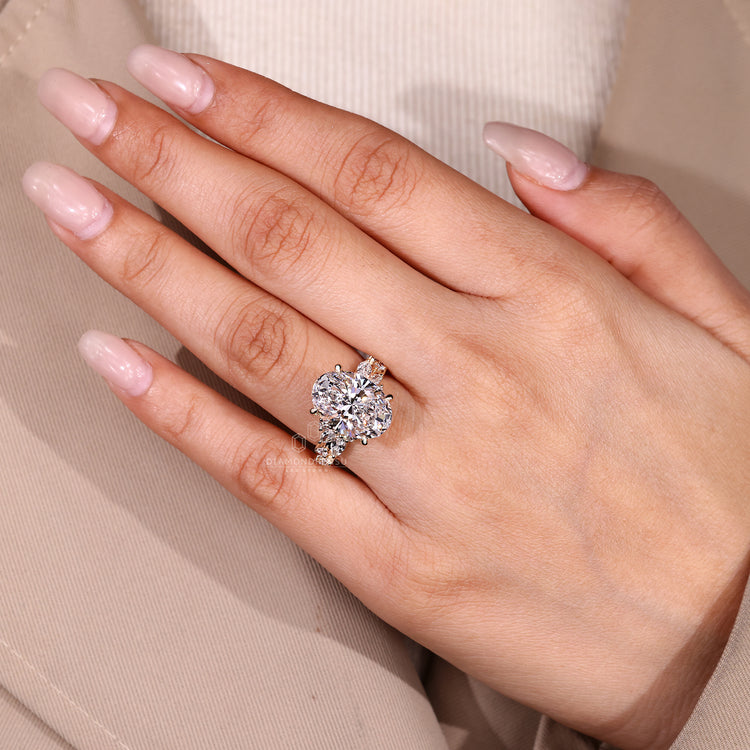 Oval Cut Diamond Ring classic cluster style design.
