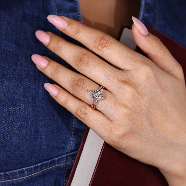 Marquise diamond ring with seven stone style.
