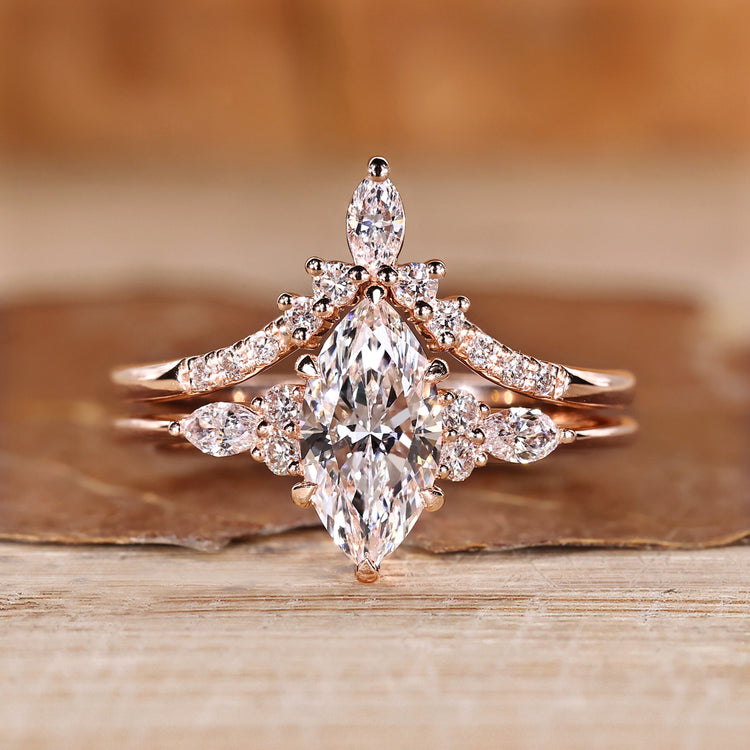 Marquise diamond bridal set with round and marquise side stones.