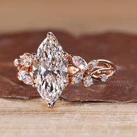 Lab grown marquise diamond ring cluster style.