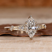 Vintage marquise diamond ring elegant style.