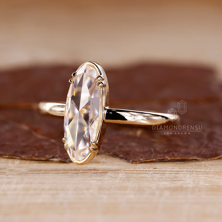 Lab grown moval rose diamond ring solitaire style.
