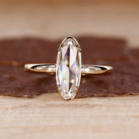 Moval rose cut diamond ring solitaire double claw prong.
