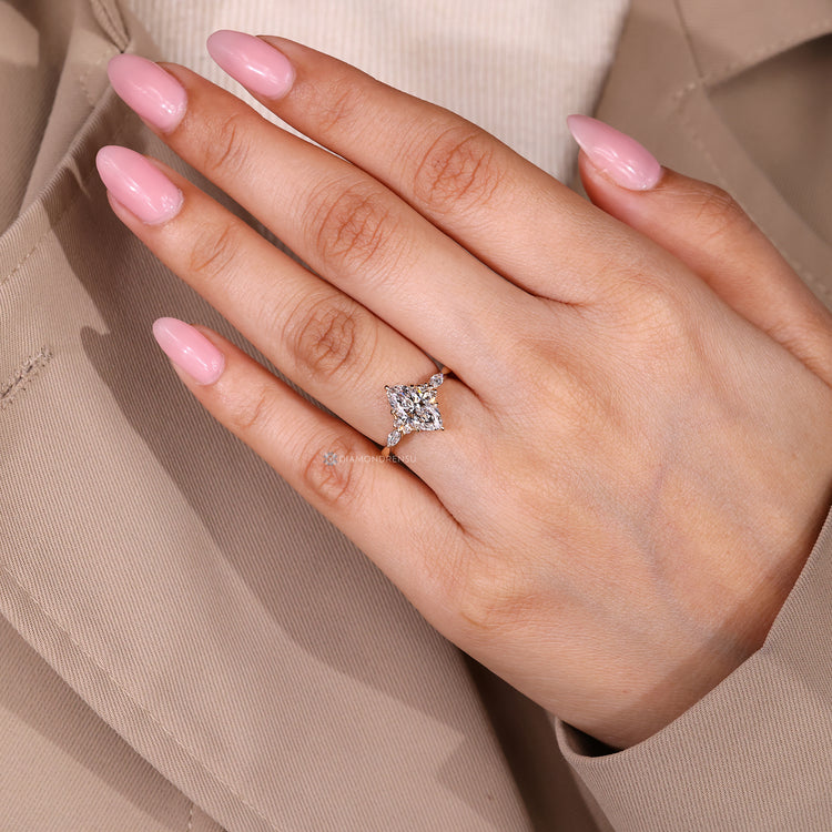 Marquise ring with Muse setting and six claw prongs.