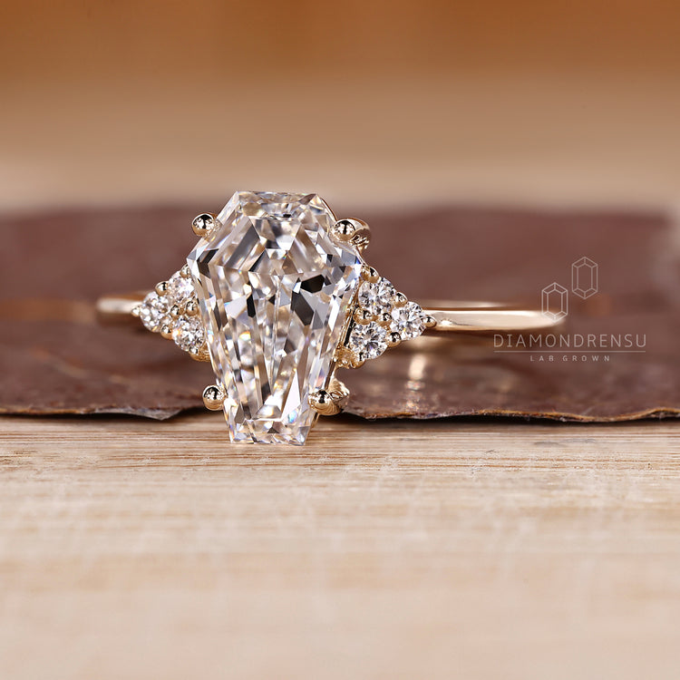 Lab grown coffin diamond ring muse style.