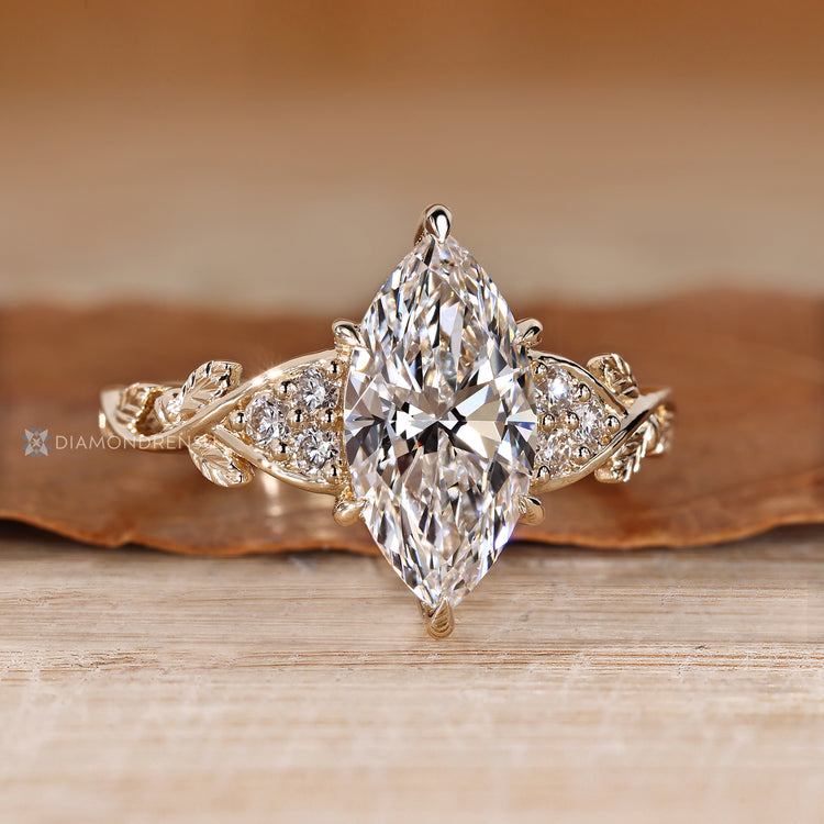 Nature inspired marquise diamond ring leaf design.
