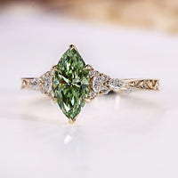 Marquise diamond ring with tulip basket setting.