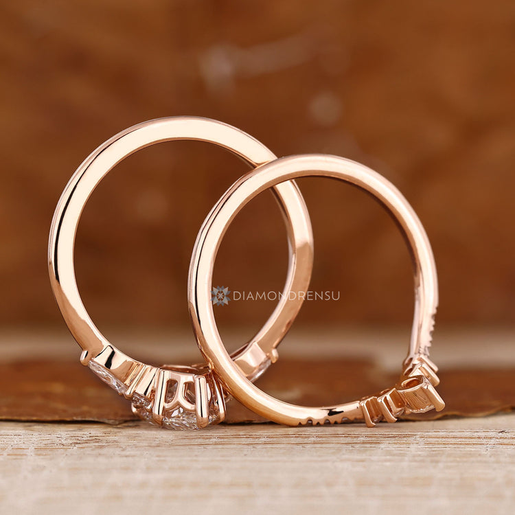Marquise diamond ring with seven stone Muse setting.