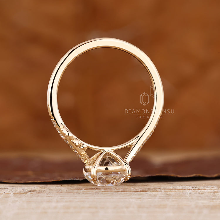 Round old cut diamond ring nature inspired design.
