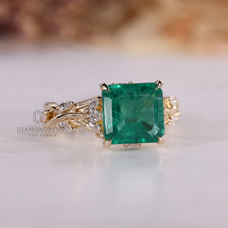Handmade Asscher emerald ring twisted shank cluster.
