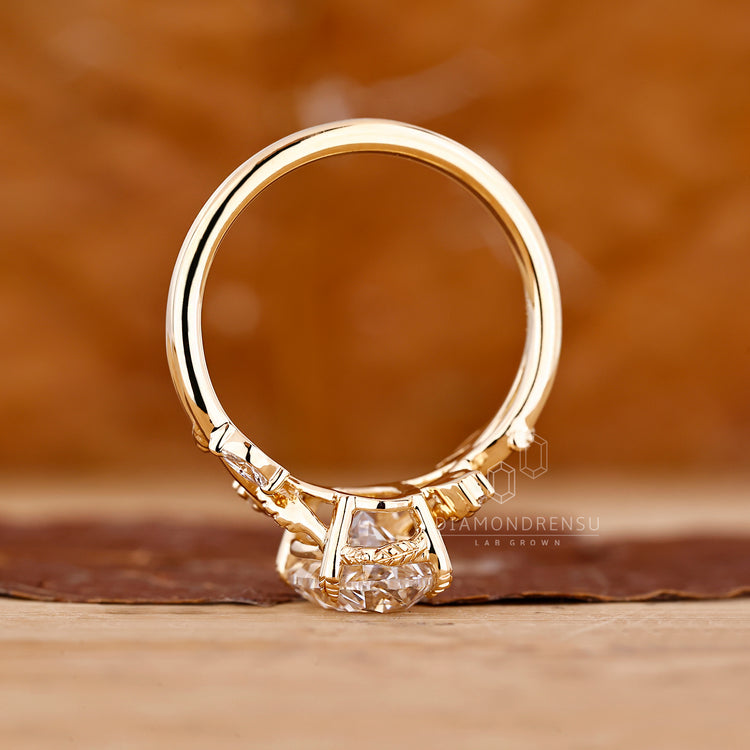 Oval diamond ring marquise round stones cluster set.
