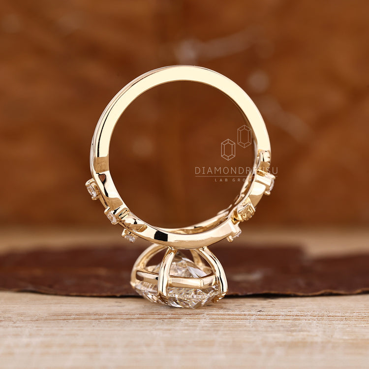 Pear Cut Diamond Ring twisted shank cluster style.
