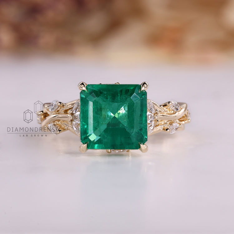 Asscher emerald ring marquise stones cluster twisted shank.
