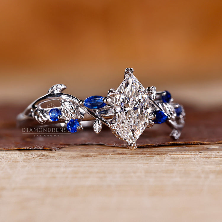 Marquise diamond ring cluster nature inspired style.
