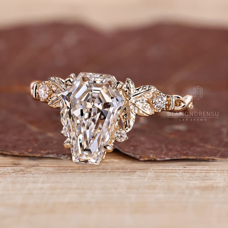 Coffin cut ring claw prong setting design.