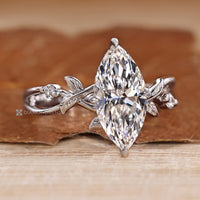 Nature inspired marquise diamond ring setting.