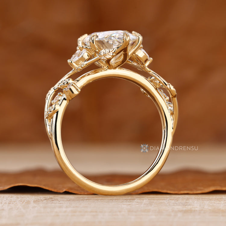 Lab grown marquise diamond ring with leaf prongs.