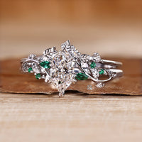 Dutch marquise bridal set with nature inspired wedding band.