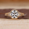 Octagon Old European Cut Ring with trillion side stones.
