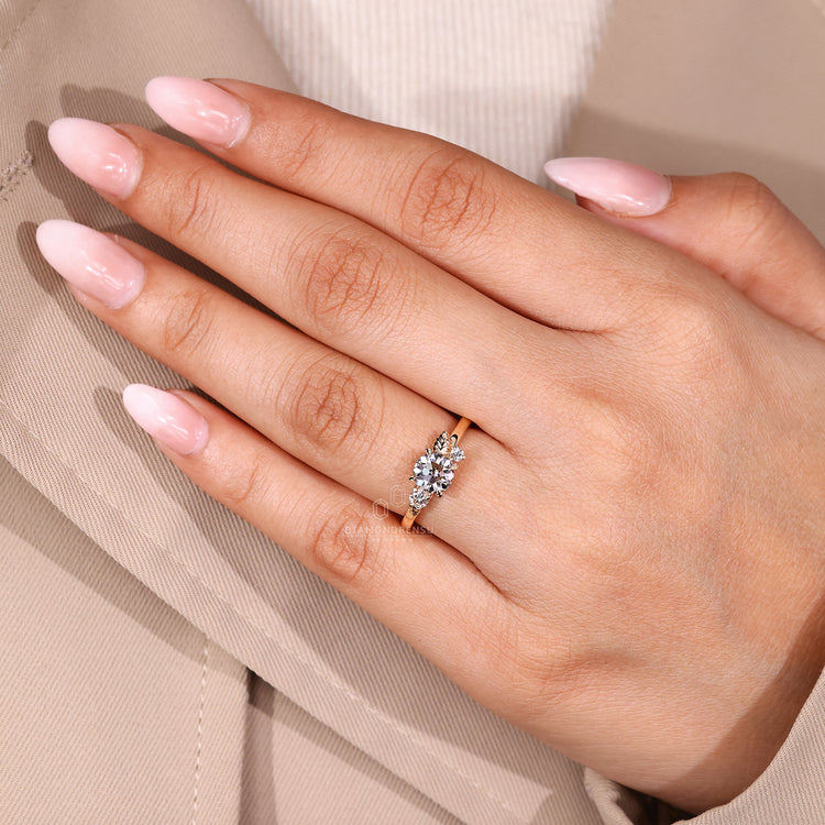 Round side stones Round Old European Cut three stone ring.
