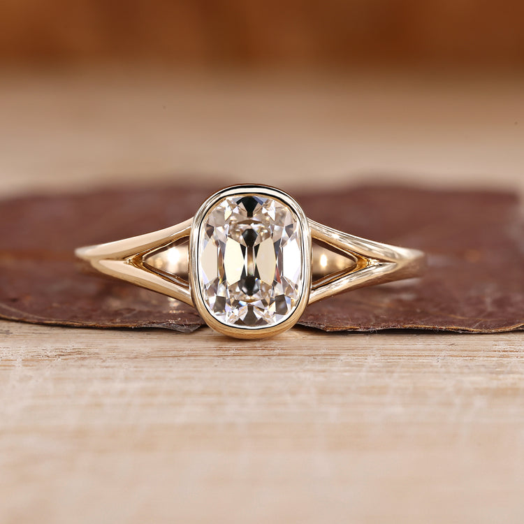 Cushion Old Mine Cut Ring bezel solitaire style.

