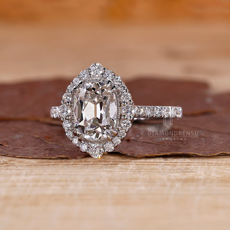 Vintage halo Cushion Old European Cut Ring design.
