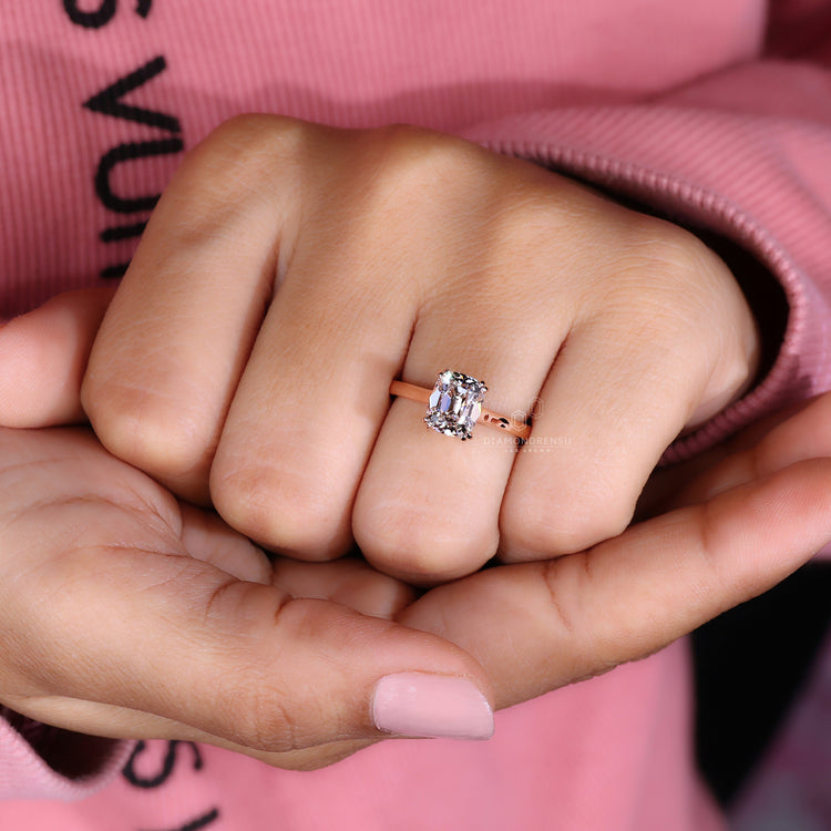 Cushion old European cut ring double prong cathedral.