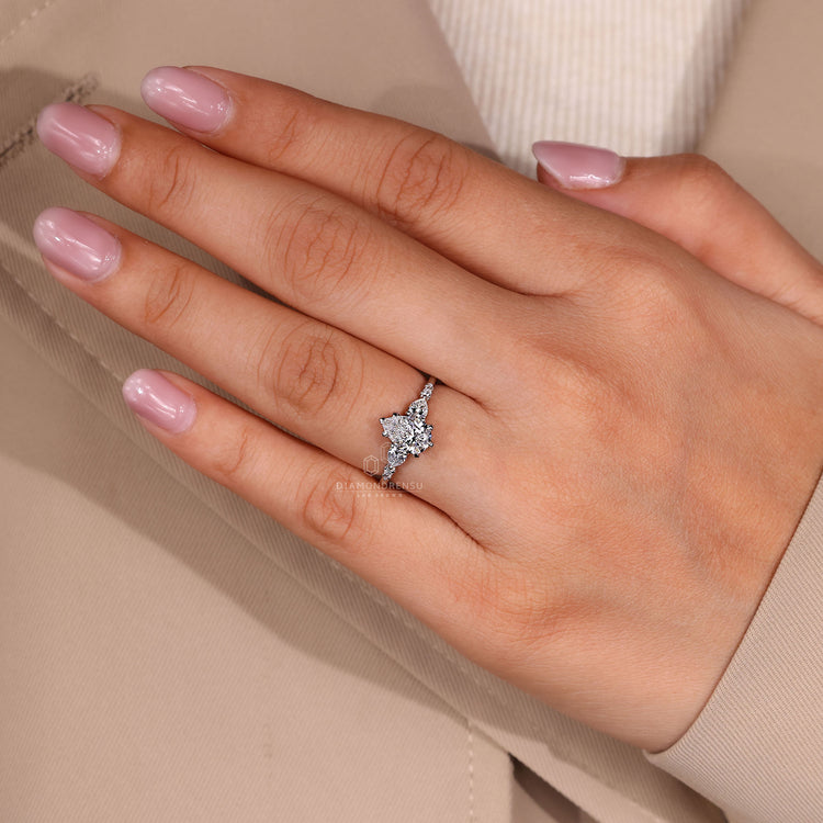 Pear cut diamond ring IGI certified seven stone.

