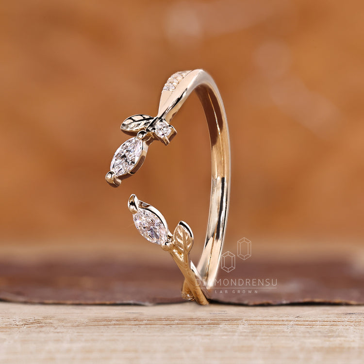 Wedding band with marquise and round diamonds.