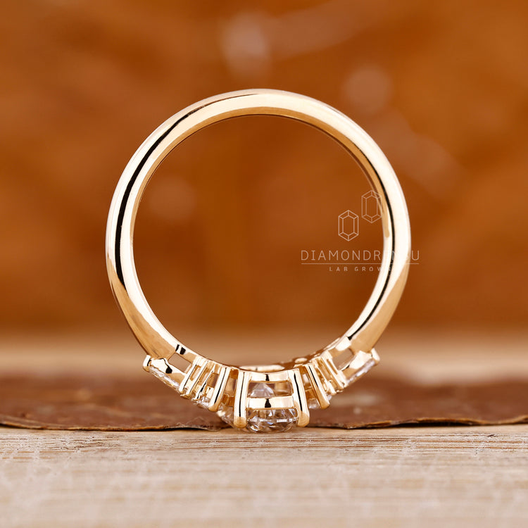 Oval diamond ring marquise round stones muse set.
