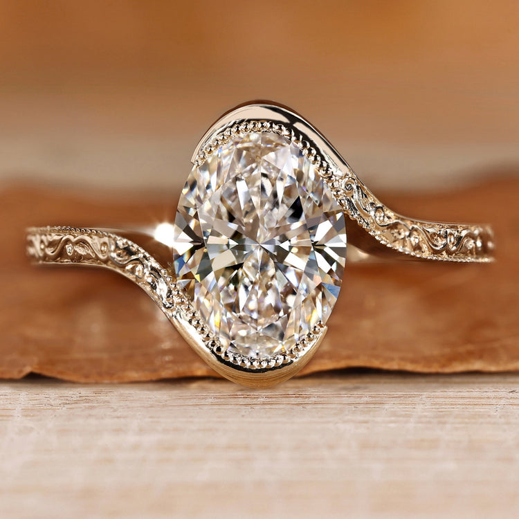 Oval cut diamond ring with solitaire setting.