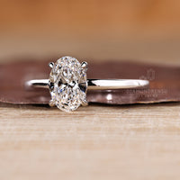 Hidden halo oval engagement ring round diamond style.