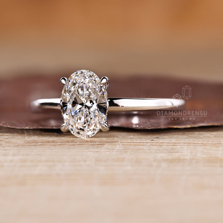 Hidden halo oval engagement ring round diamond style.