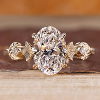 Vintage diamond ring with oval cut centre stone.
